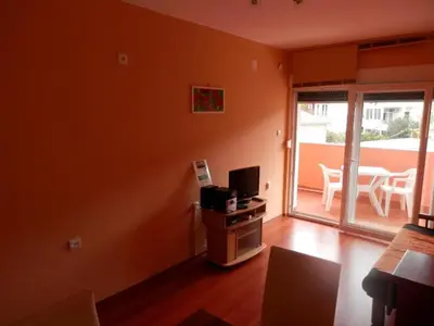 TV i/ili zabavni centar u objektu Apartments St Rialto - Comfort One-Bedroom Apartment with Balcony
