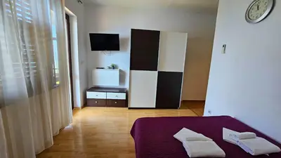 Krevet ili kreveti u jedinici u objektu Apartmani Brela 5