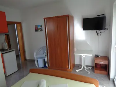 TV i/ili zabavni centar u objektu Apartments Radoš