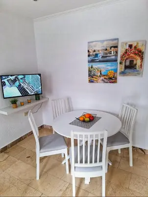 TV i/ili zabavni centar u objektu Apartmani Olea
