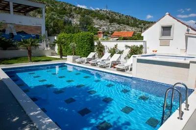 Bazen u objektu Lux apartment Sara with heated pool and jacuzzi ili u blizini