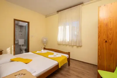 Krevet ili kreveti u jedinici u objektu Beachfront Apartments
