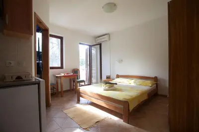 Krevet ili kreveti u jedinici u objektu Apartments Pinus
