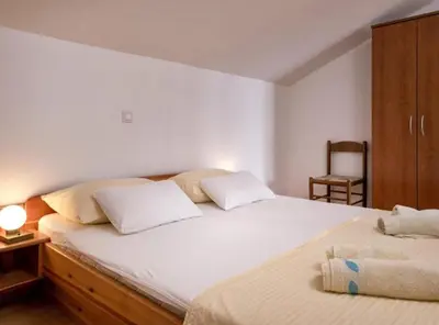 Krevet ili kreveti u jedinici u objektu Dolac Green Side Apartments