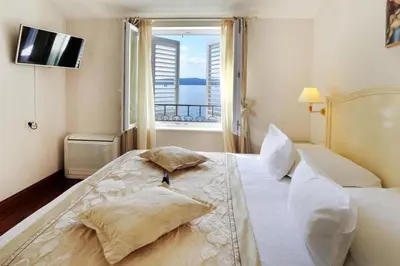 Krevet ili kreveti u jedinici u objektu Luxury Apartment with Balcony and Panoramic View - Hotel Sunceva Postelja Brela
