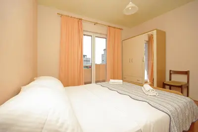 Krevet ili kreveti u jedinici u objektu Orange House three bedroom apartment with sea view