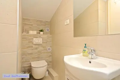 Kupaonica u objektu Duplex Apartment for 10 persons, first row by the sea, Beach House Ana