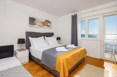 Krevet ili kreveti u jedinici u objektu Seaside Apartment Blue