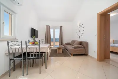 TV i/ili zabavni centar u objektu Apartmani ELA
