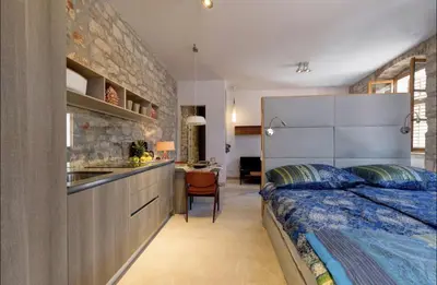 Krevet ili kreveti u jedinici u objektu Townhouse Suite Danish Art