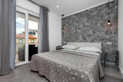 Krevet ili kreveti u jedinici u objektu Apartmani Makarska 4