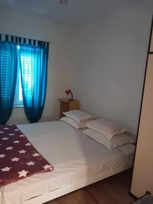 Krevet ili kreveti u jedinici u objektu Doli Apartment