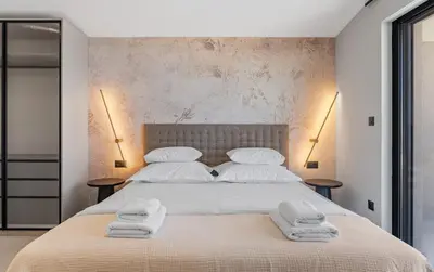 Krevet ili kreveti u jedinici u objektu Seaview Villa Libero with spa zone, pool, billiard