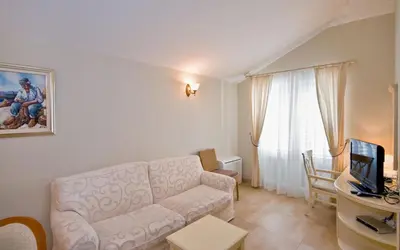 TV i/ili zabavni centar u objektu Hotel Sunceva Postelja Brela - Luxury Apartment with Balcony and Panoramic View