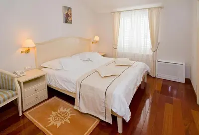 Krevet ili kreveti u jedinici u objektu Hotel Sunceva Postelja Brela - Luxury Apartment with Balcony and Panoramic View