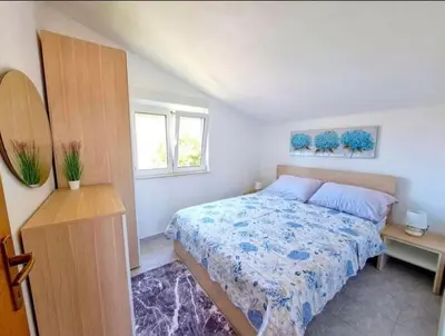 Krevet ili kreveti u jedinici u objektu Apartments by the sea Medici, Omis - 23741