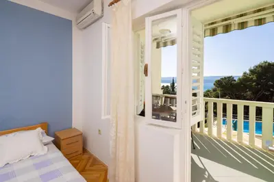 Krevet ili kreveti u jedinici u objektu Fortuna Apartments - Shared Pool