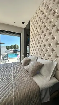 Krevet ili kreveti u jedinici u objektu Villa Marco Polo , grijani bazen , jacuzzi
