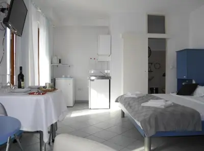 Krevet ili kreveti u jedinici u objektu Dugi Rat Seaside Apartments