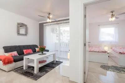 Krevet ili kreveti u jedinici u objektu La Perla Apartments 2