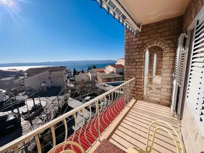 Balkon ili terasa u objektu Apartment Joza with pool and sea view, 2 min walk to the beach