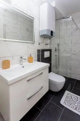 Kupaonica u objektu Aga Apartments Nemira