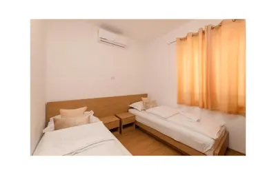 Krevet ili kreveti u jedinici u objektu Beautiful Home In Supetar