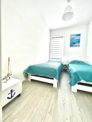 Krevet ili kreveti u jedinici u objektu Apartment Stairs to Adriatic 50m from a beach!