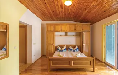 Krevet ili kreveti u jedinici u objektu Two-Bedroom Apartment Makarska With Sea View 03