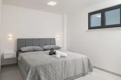 Krevet ili kreveti u jedinici u objektu Luxury Villa Ivana Brela heated pool 28 m2, gym
