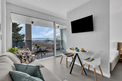 TV i/ili zabavni centar u objektu Perla Apartments Baska Voda