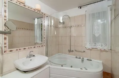 Kupaonica u objektu Exclusive Beachfront Villa with Pool for 8 at Island Brač