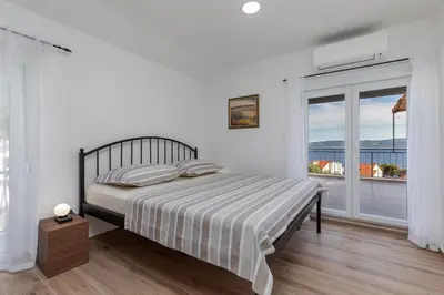 Krevet ili kreveti u jedinici u objektu Apartman Irena