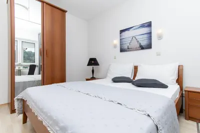 Krevet ili kreveti u jedinici u objektu Apartment and Rooms Ana