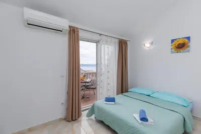 Krevet ili kreveti u jedinici u objektu Apartments with parking space Baska Voda, Makarska - 23641