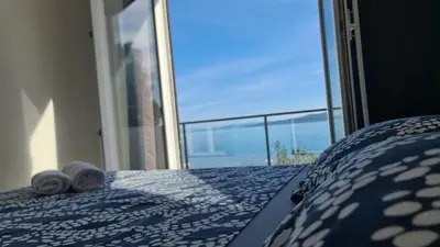 Krevet ili kreveti u jedinici u objektu Apartments by the sea Pisak - Omis - 23886