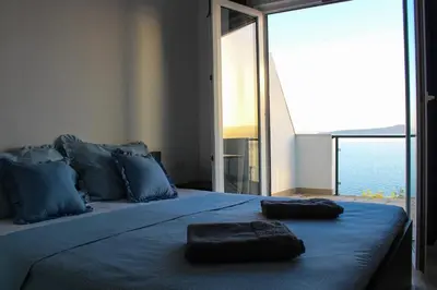 Krevet ili kreveti u jedinici u objektu Apartments by the sea Pisak - Omis - 23886