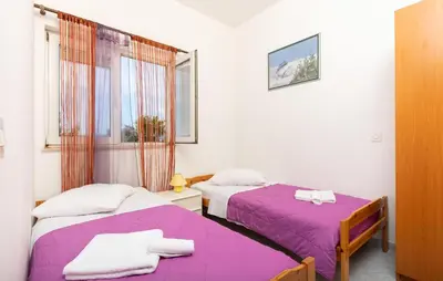 Krevet ili kreveti u jedinici u objektu Gorgeous Apartment In Omis With Wifi