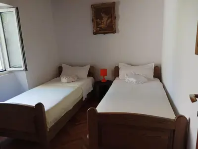 Krevet ili kreveti u jedinici u objektu Captains Heritage - Traditional Apartment in Stari Grad