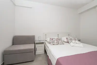 Krevet ili kreveti u jedinici u objektu Apartment 3 Vera i Ćiro Novak, sea view and free parking