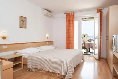 Krevet ili kreveti u jedinici u objektu Beachfront Brela Apartments Ljubica