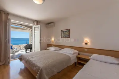 Krevet ili kreveti u jedinici u objektu Beachfront Brela Apartments Ljubica