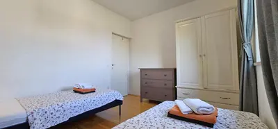 Krevet ili kreveti u jedinici u objektu Spacious villa,pool, sea views, terraces, gardens - Villa Maria