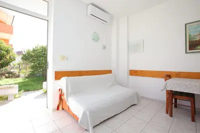 Krevet ili kreveti u jedinici u objektu Family friendly seaside apartments Podstrana - Split - 23954