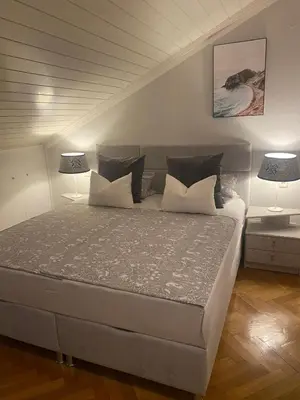 Krevet ili kreveti u jedinici u objektu Sunfeather Apartment