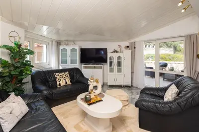 TV i/ili zabavni centar u objektu Sunfeather Apartment