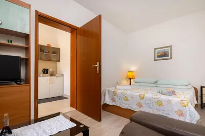 Krevet ili kreveti u jedinici u objektu Poolside Apartments