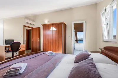 Krevet ili kreveti u jedinici u objektu Spacious & Charming Apartment 128 m2 with Sea View