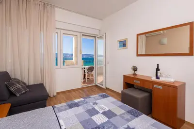 Krevet ili kreveti u jedinici u objektu Diamond Beachfront Apartments