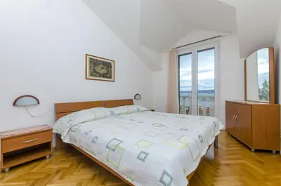Krevet ili kreveti u jedinici u objektu Apartment and Rooms Mate